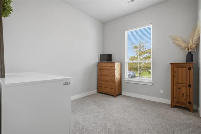a bathroom with a tub and a sink