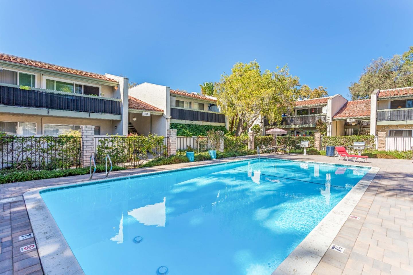 5510 Armitos Avenue, Unit 4 Goleta, CA 93117 - Photo 23 of 23 a view of a house with swimming pool