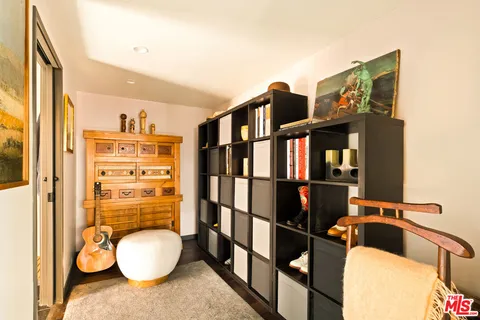 a bathroom with a sink toilet and a mirror