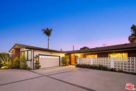 a view of a building with a ocean view