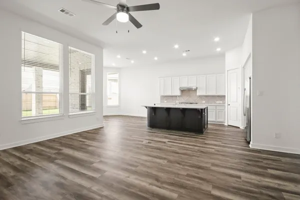 a bathroom with a sink double vanity and a mirror