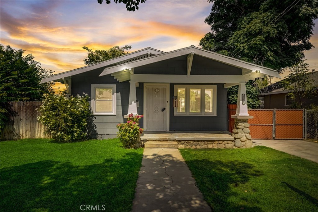3355 Holding Street Riverside, CA 92501 - Photo 1 of 1 a front view of a house with garden