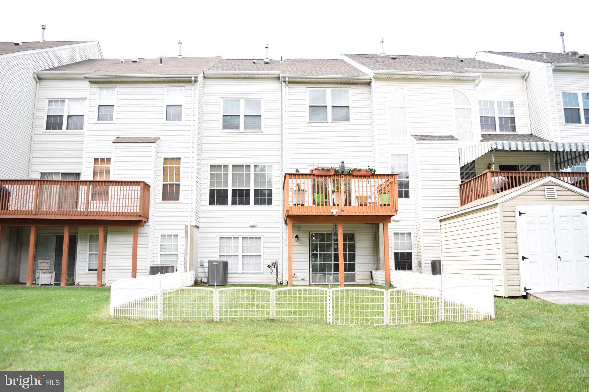 46 Threadleaf Terrace Burlington Township, NJ 08016 - Photo 2 of 23 Slider door to yard in basement. Deck off kitchen