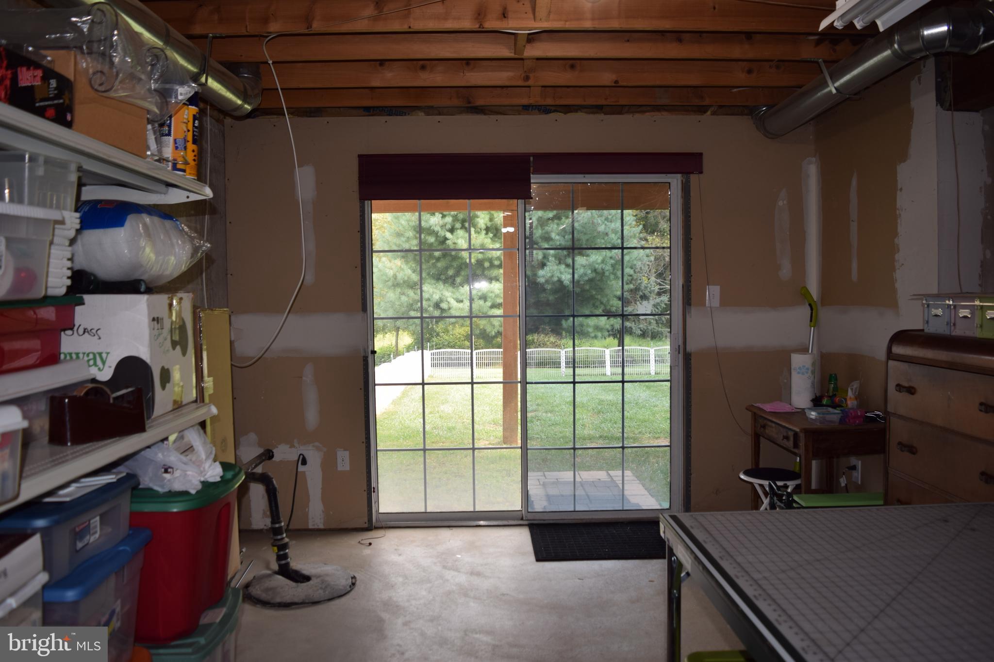 46 Threadleaf Terrace Burlington Township, NJ 08016 - Photo 22 of 23 Unfinished basement with slider door to yard