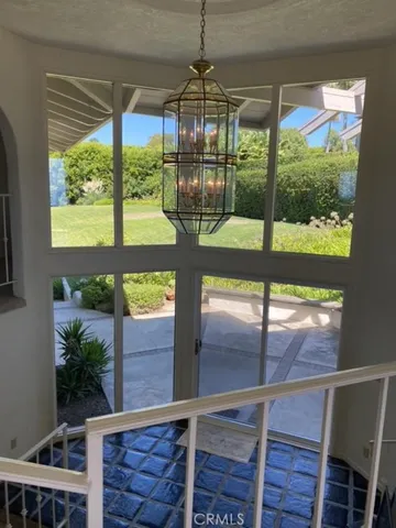 a view of a room with windows