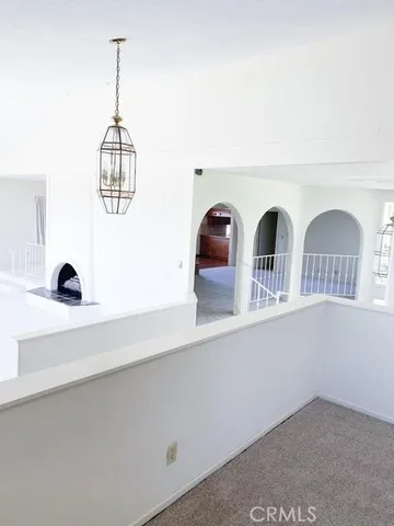 a view of living room with furniture and a window