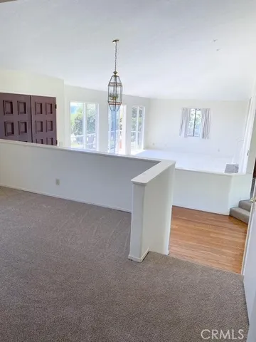 a view of kitchen and windows