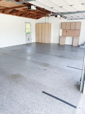 a view of a room with wooden walls