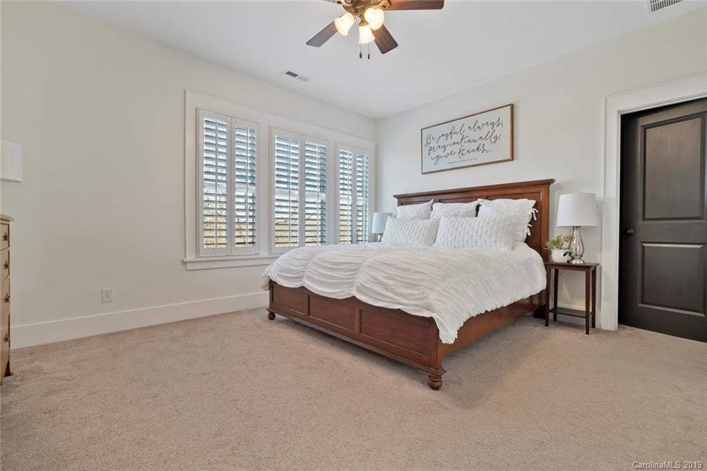436 Hollyhock Lane Fort Mill, SC 29708 - Photo 22 of 34 a bed sitting in a bedroom next to a window