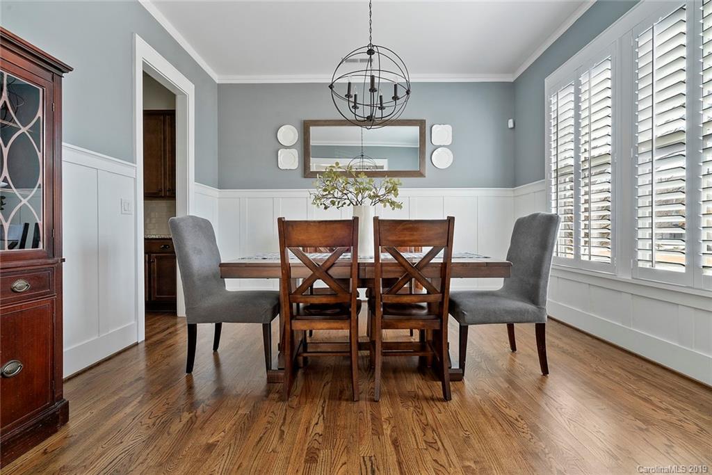 436 Hollyhock Lane Fort Mill, SC 29708 - Photo 7 of 34 a view of a dining room with furniture window and wooden floor