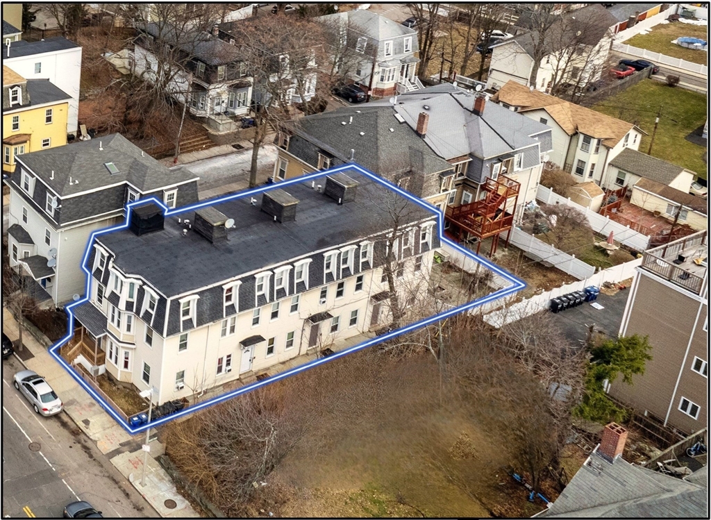 94 Walnut Avenue Boston, MA 02119 - Photo 1 of 4 an aerial view of a house with a street