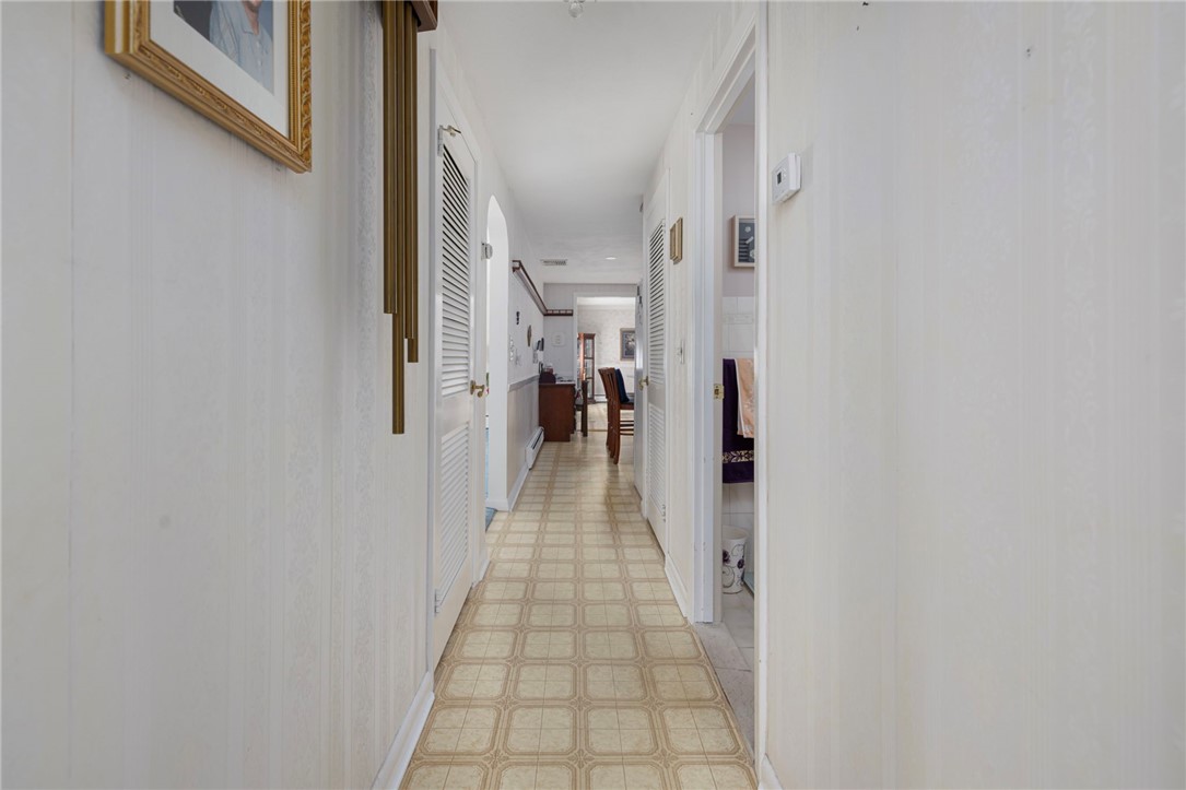 39 Holiday Avenue Warwick, RI 02888 - Photo 17 of 35 Head back down the hall to the formal living room.