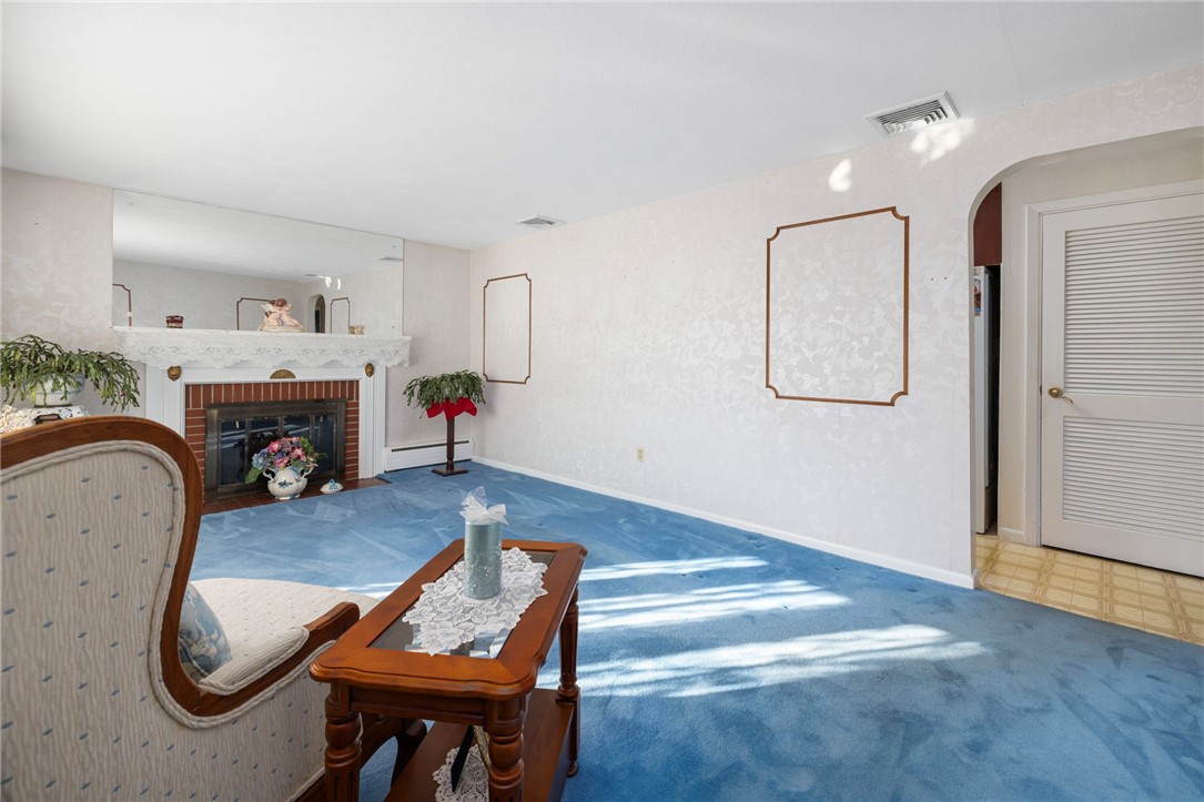 39 Holiday Avenue Warwick, RI 02888 - Photo 19 of 35 Another perspective of the formal living room shows its large size.