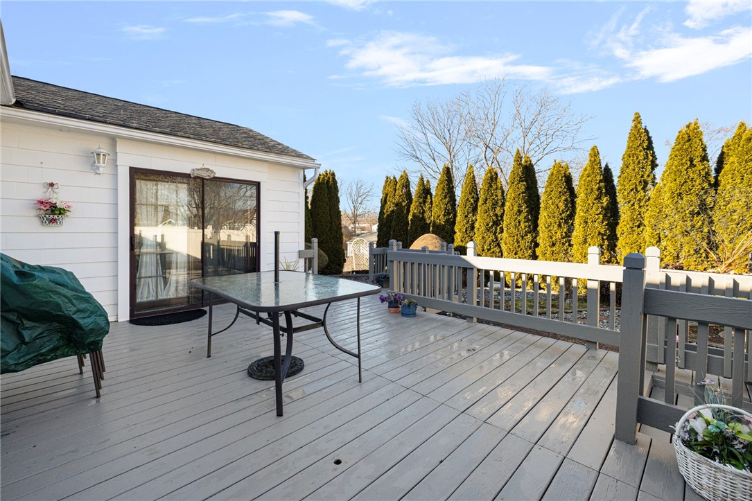 39 Holiday Avenue Warwick, RI 02888 - Photo 26 of 35 The two-tiered deck has two access points.