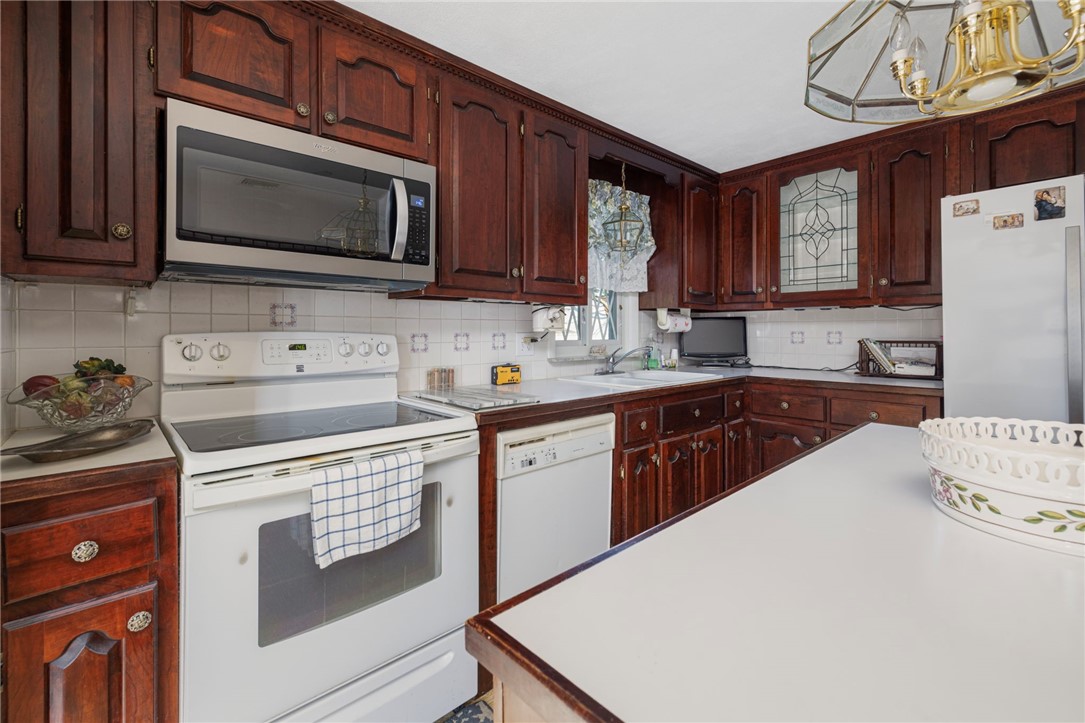 39 Holiday Avenue Warwick, RI 02888 - Photo 10 of 35 Plenty of counterspace, ample storage and fully applianced.