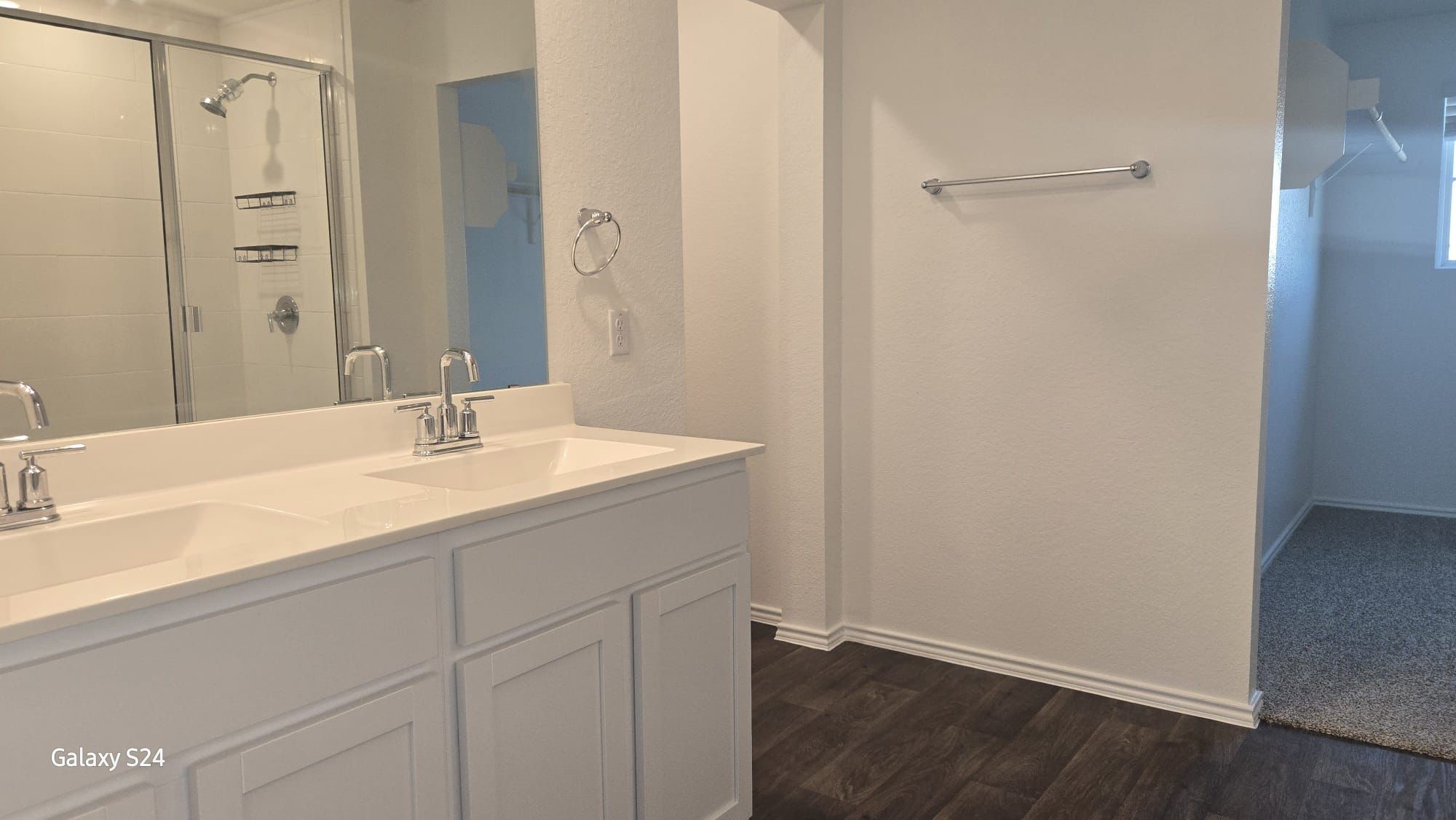 14821 Perlino Way, Unit A Manor, TX 78653 - Photo 11 of 20 a bathroom with a sink and a mirror
