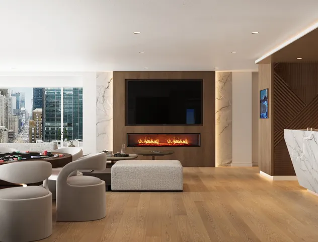 a living room with furniture and a lamp