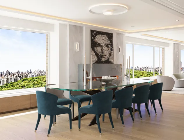 a living room with furniture and large windows