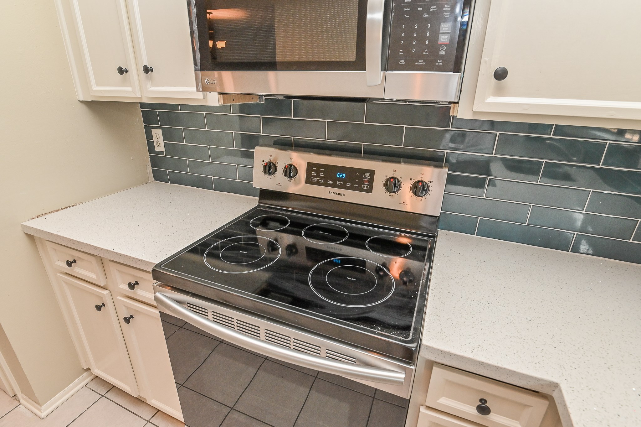 1619 Prairie Mark Lane Houston, TX 77077 - Photo 12 of 25 a close view of a stove top oven sitting inside of a kitchen