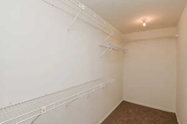 a view of a room with racks on the wall