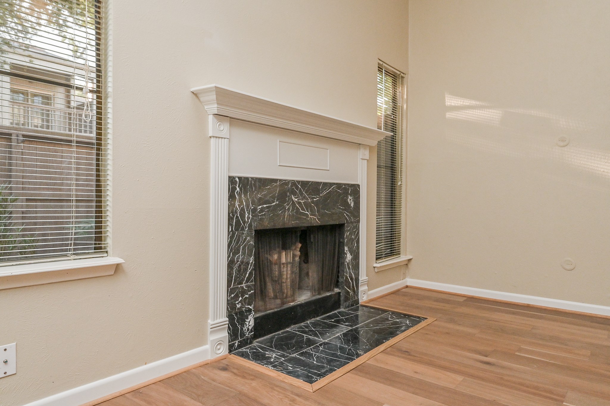 1619 Prairie Mark Lane Houston, TX 77077 - Photo 8 of 25 a living room with a fireplace and a table