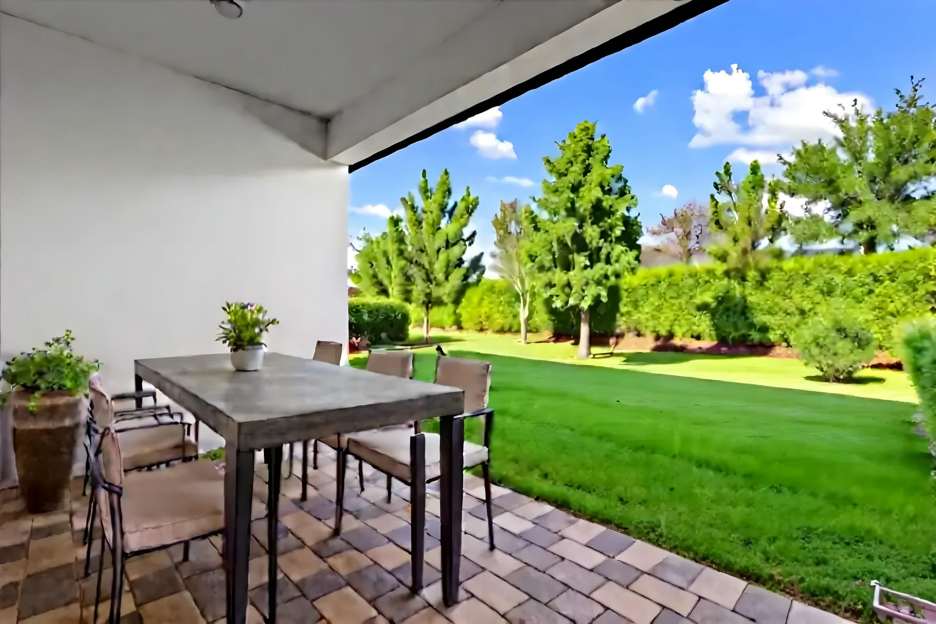 4801 Chantilly Road Lake Worth, FL 33467 - Photo 19 of 54 Back covered Patio