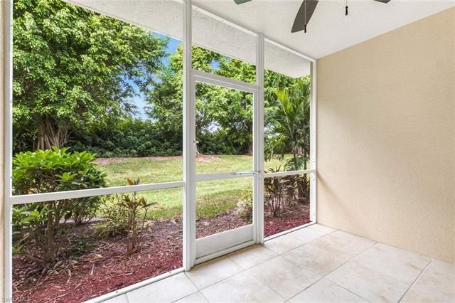 a view of backyard with green space