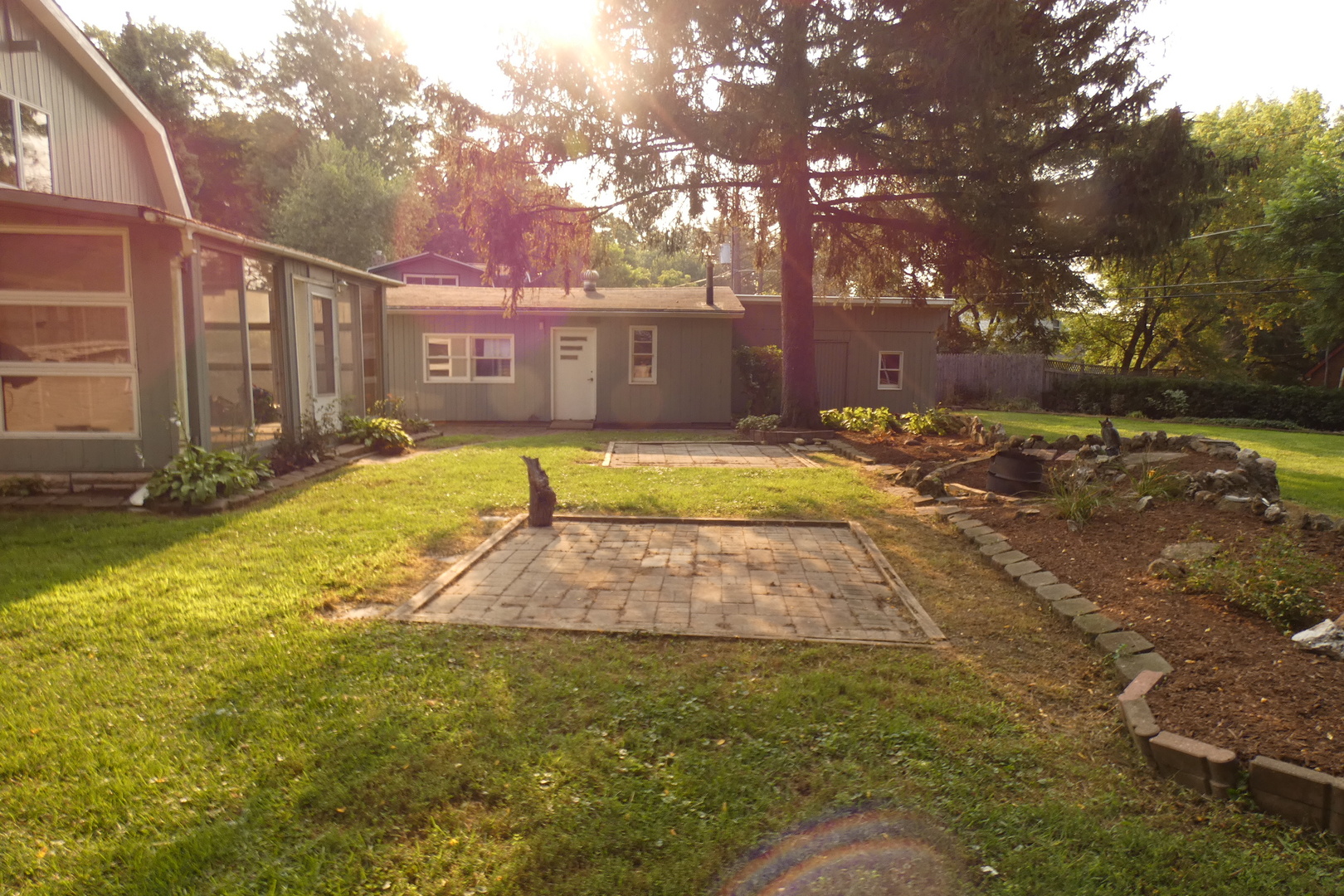 109 Crescent Road Fox River Grove, IL 60021 - Photo 3 of 4 a view of a yard with swimming pool