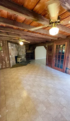 a large kitchen with stainless steel appliances a large counter top