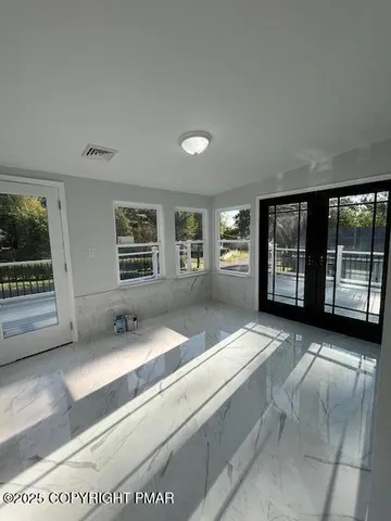 a hallway with a large window