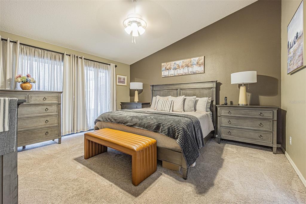 9809 La Rita Place Riverview, FL 33569 - Photo 13 of 59 a bedroom with a bed and a table
