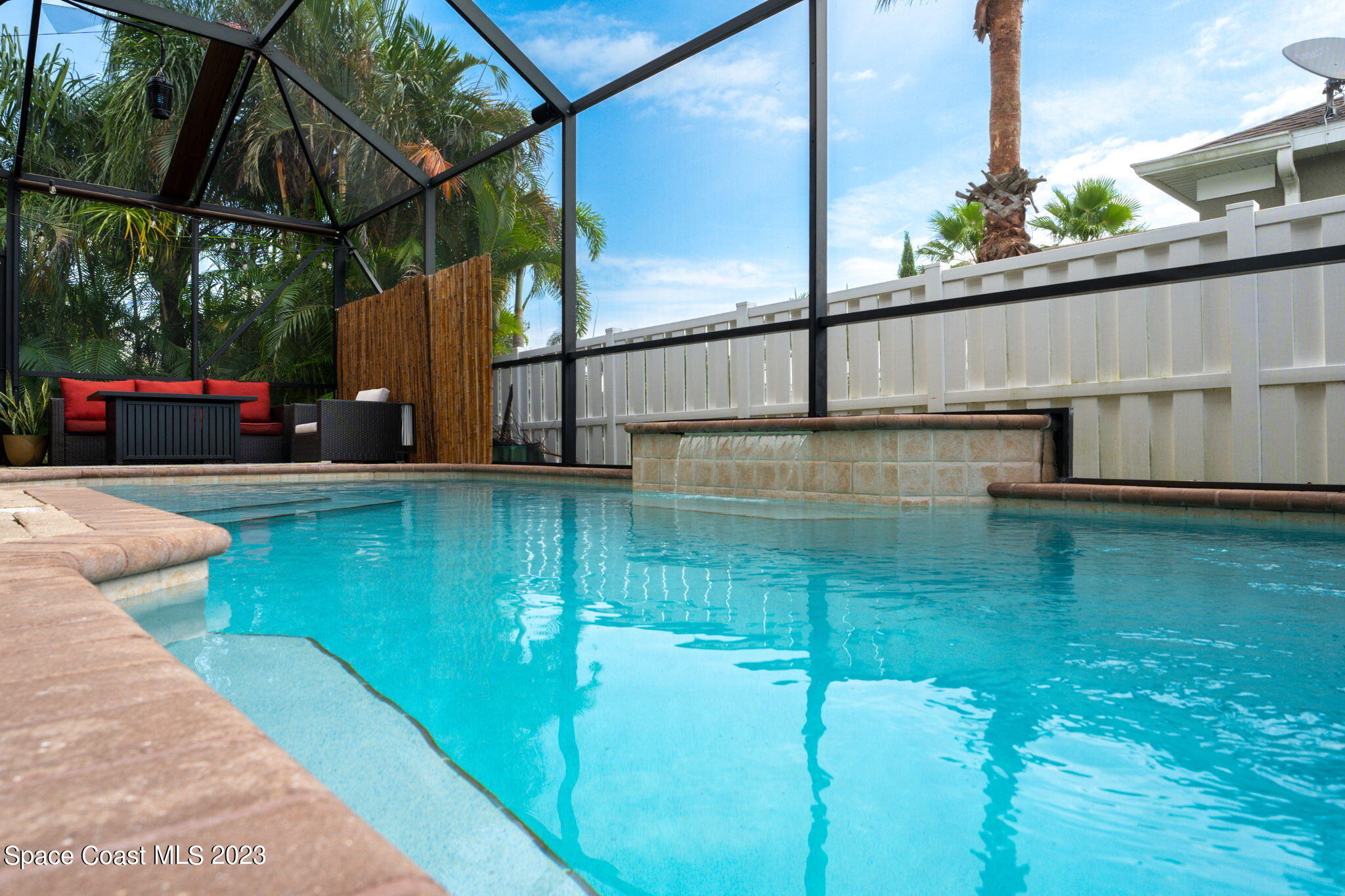 6265 Trieda Drive Melbourne, FL 32940 - Photo 19 of 26 a view of swimming pool with a patio