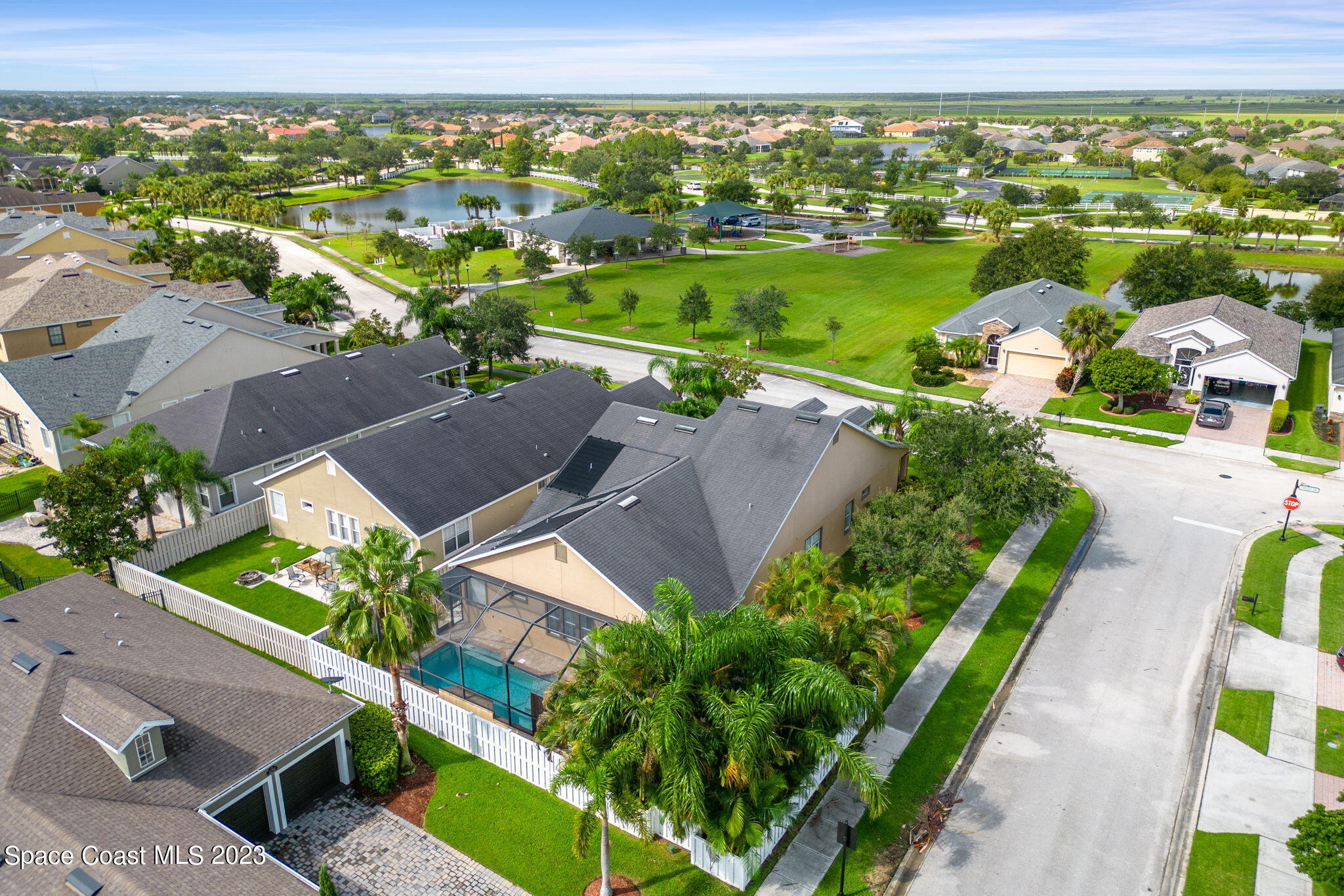 6265 Trieda Drive Melbourne, FL 32940 - Photo 21 of 26 an aerial view of a house with a garden