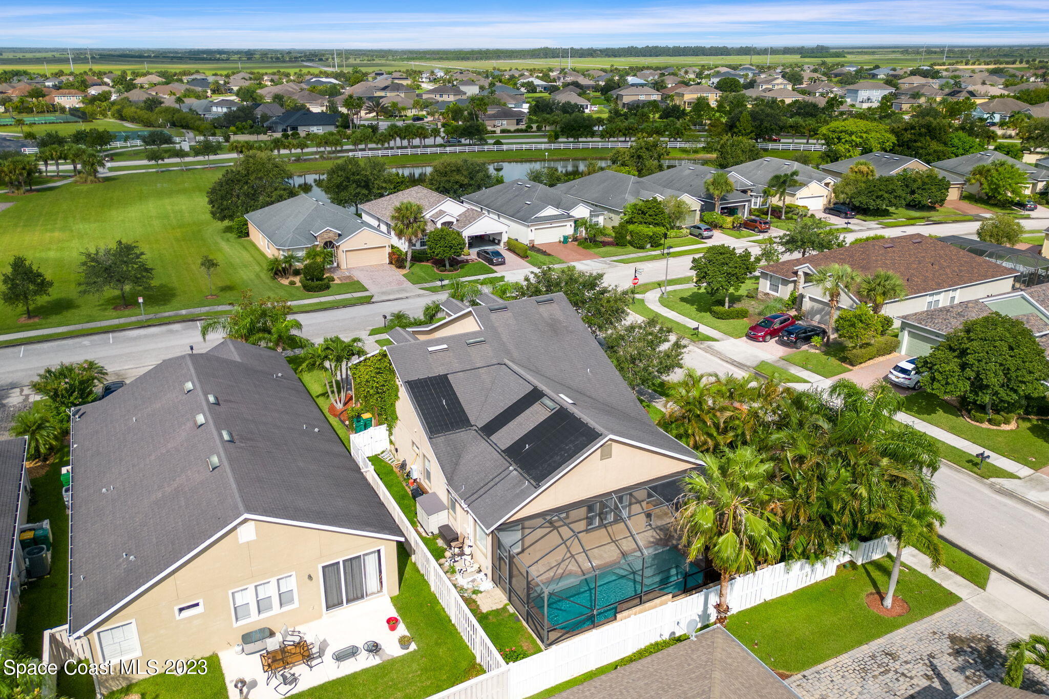 6265 Trieda Drive Melbourne, FL 32940 - Photo 22 of 26 an aerial view of residential houses with outdoor space