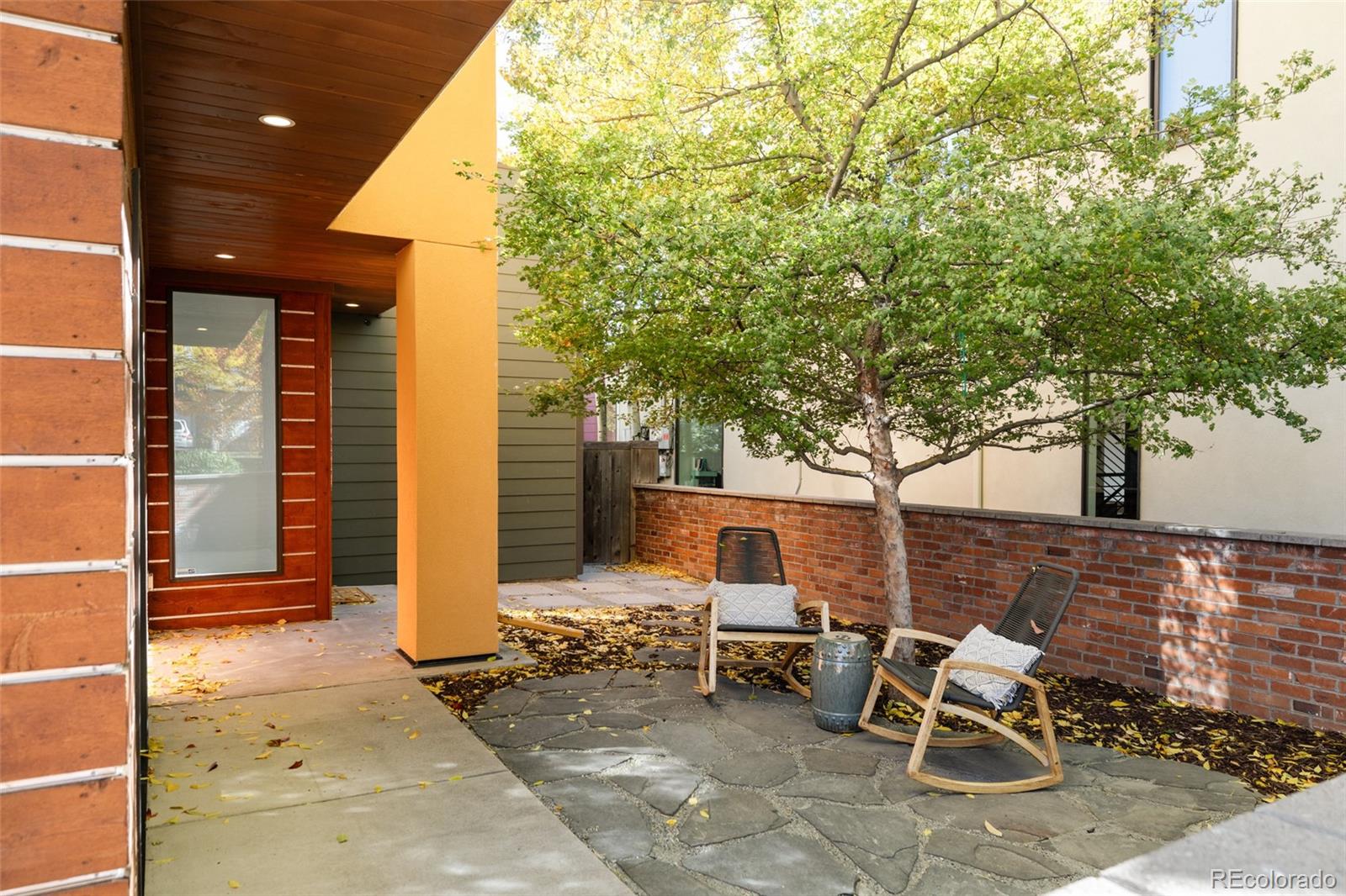 2696 Meade Street Denver, CO 80211 - Photo 3 of 46 a view of a chairs and table in backyard