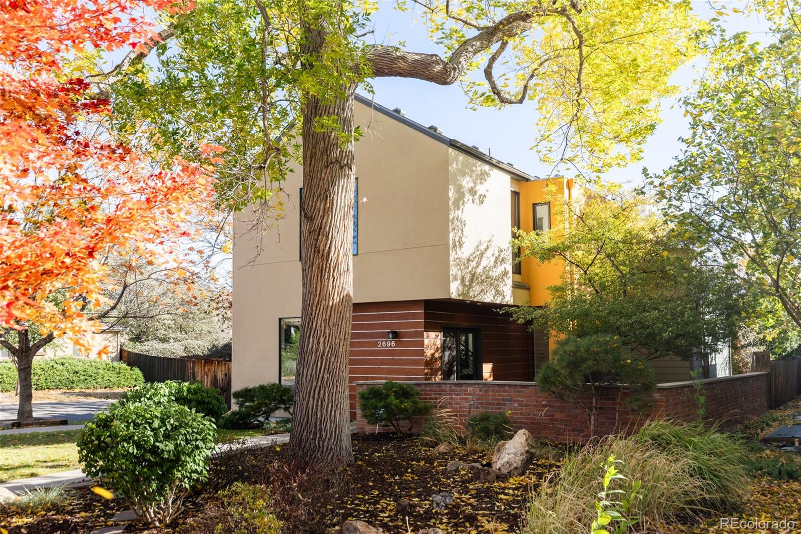2696 Meade Street Denver, CO 80211 - Photo 45 of 46 a front view of a house with garden