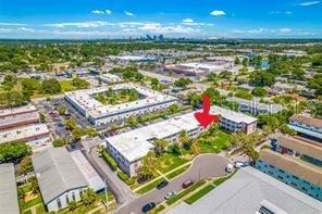 3125 36th Street North, Unit 208 St. Petersburg, FL 33713 - Photo 2 of 29 an aerial view of residential houses with outdoor space and ocean view