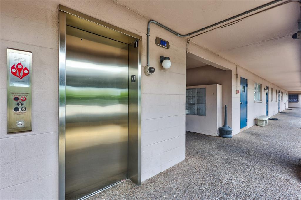 3125 36th Street North, Unit 208 St. Petersburg, FL 33713 - Photo 24 of 29 a view of a refrigerator in kitchen and an empty room