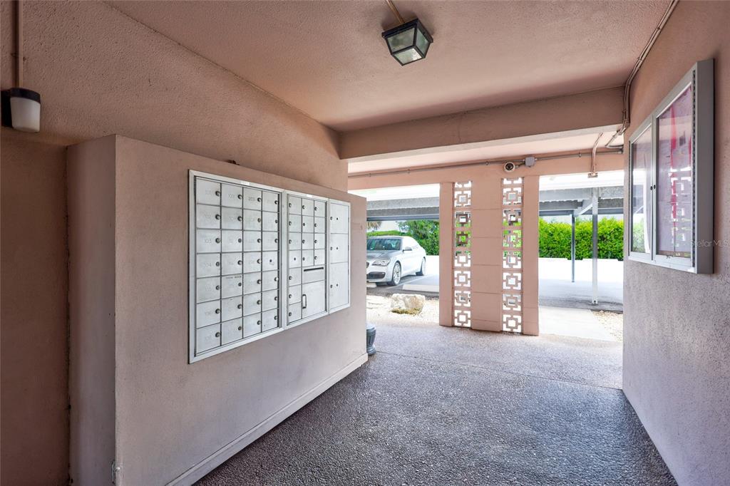 3125 36th Street North, Unit 208 St. Petersburg, FL 33713 - Photo 25 of 29 a view of workspace with furniture and garden view