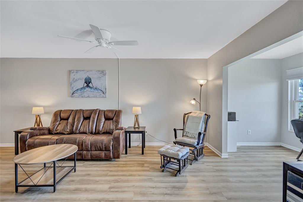 3125 36th Street North, Unit 208 St. Petersburg, FL 33713 - Photo 9 of 29 a living room with furniture