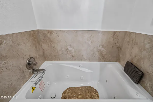 a view of a house with swimming pool and a yard