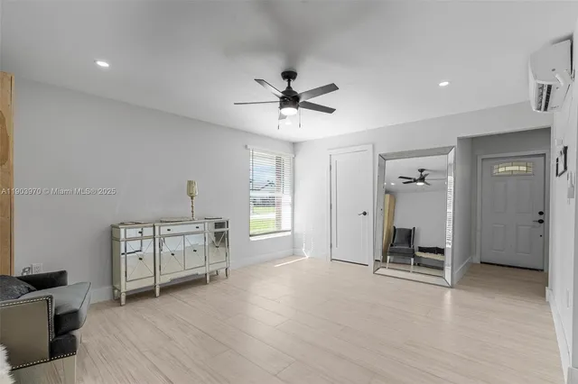 a view of workspace with furniture and window