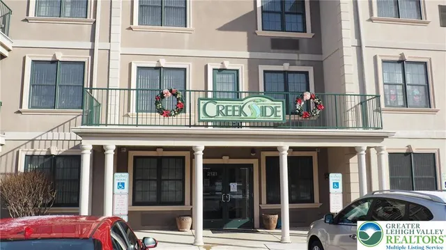 a front view of a building and a entrance