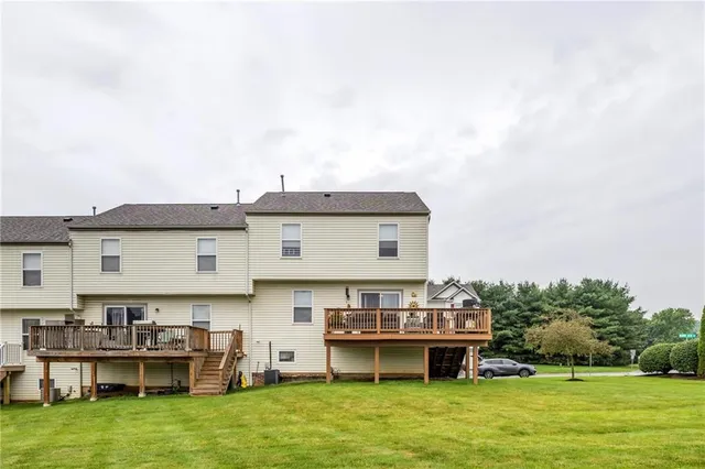 a aerial view of a house with a garden and plants