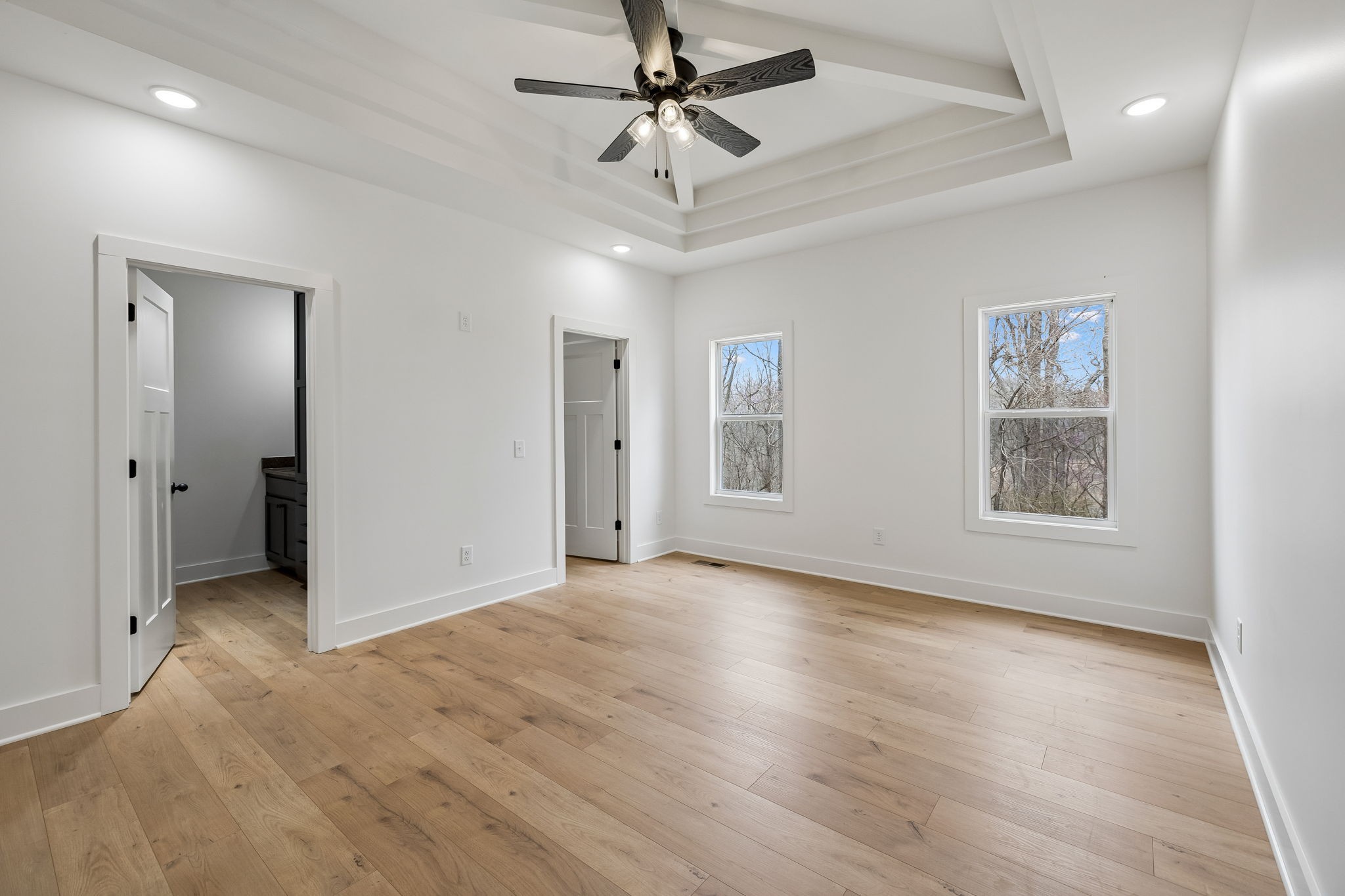 4083 Long Creek Road Lafayette, TN 37083 - Photo 24 of 36 a view of an empty room with a window and a ceiling fan