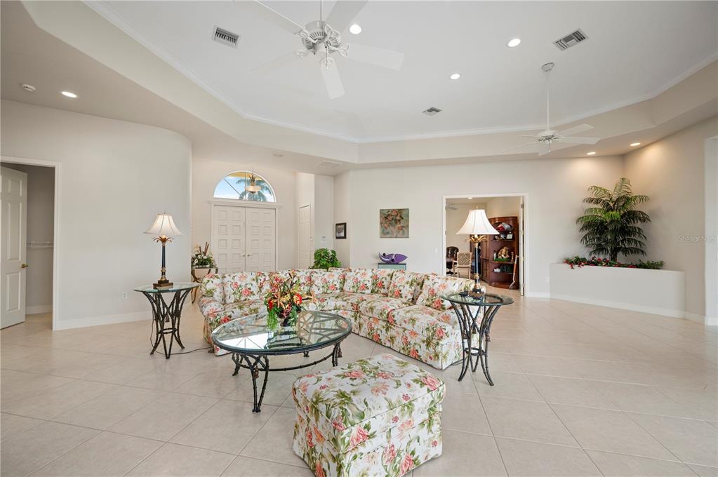 1030 Conecta Drive Punta Gorda, FL 33950 - Photo 11 of 74 a living room with furniture and a potted plant