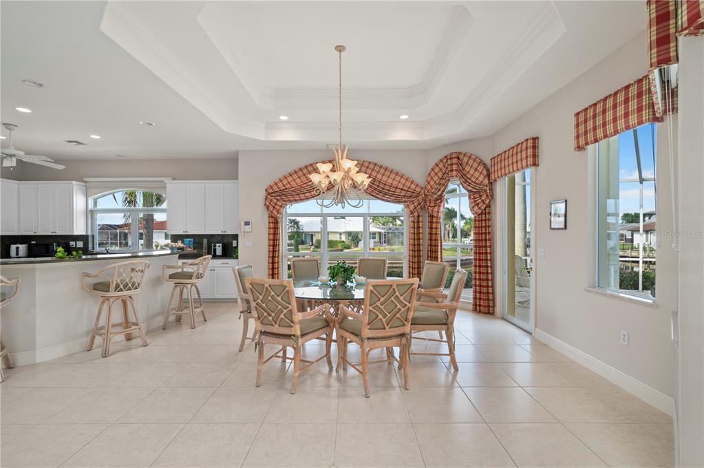 1030 Conecta Drive Punta Gorda, FL 33950 - Photo 13 of 74 a view of a dining room with furniture window and outside view