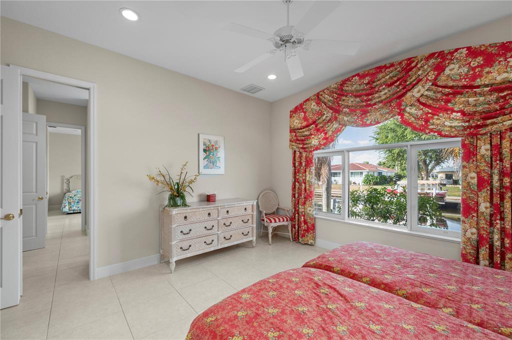 1030 Conecta Drive Punta Gorda, FL 33950 - Photo 40 of 74 a bedroom with furniture and a window