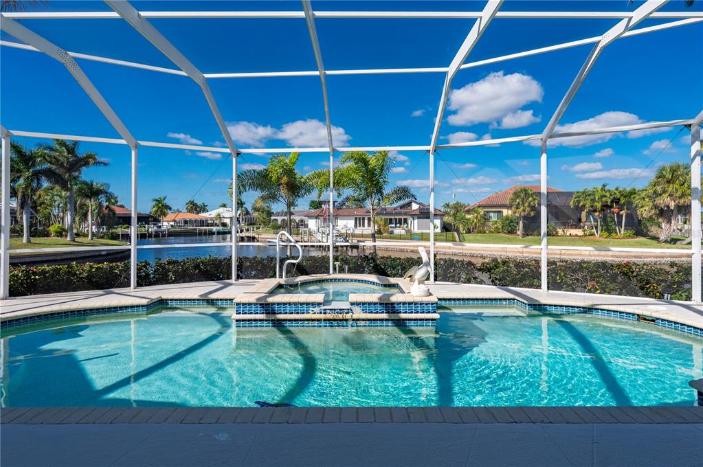 1030 Conecta Drive Punta Gorda, FL 33950 - Photo 4 of 74 a view of a swimming pool with a patio