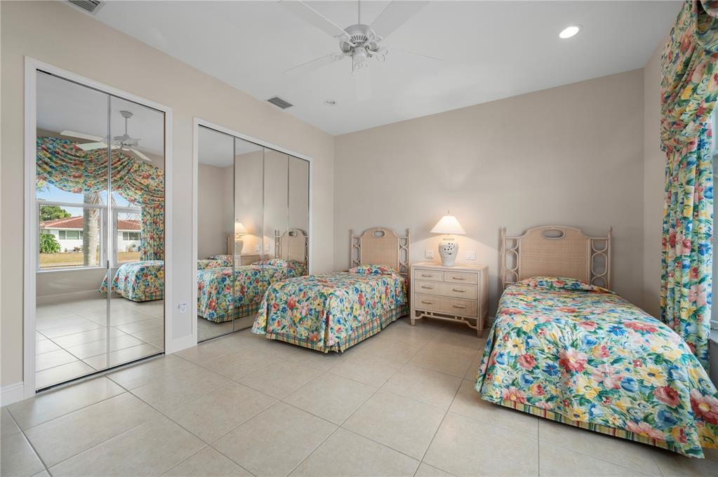 1030 Conecta Drive Punta Gorda, FL 33950 - Photo 44 of 74 a bedroom with two beds and painted walls